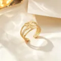 Gold titanium steel open ring, minimalist flower design, adjustable size, fashion jewelry. - Gold Hollow Flower