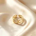 Elegant gold open ring with a modern multi-layer cross design, perfect for daily fashion wear. - Cross Knot Style / Gold