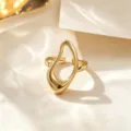 Anillo abierto geométrico minimalista dorado de acero de titanio diseño elegante. - Anillo Hueco / Dorado