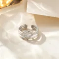 Silver multi-strand open ring with woven knot design, trendy adjustable steel jewelry. - Heart Knot Texture Style / Silver