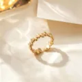 Anillo abierto minimalista de acero de titanio chapado en oro de 18k, joyería geométrica de moda. - Anillo Ovalado Entrelazado / Dorado