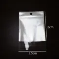 Zilveren folie zip lock verpakkingzak met hanggat voor sieraden oorbellen display 8x6.5cm - Zelfsluitende verpakkingszak / 8x6.5cm