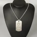Stainless steel letter Z dog tag pendant necklace, detailed hip hop street style jewelry close up. - Letter Z