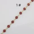 Close-up detail of gold stainless steel chain with red glitter enamel stations for DIY jewelry. - 1# Red
