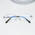 Women metal semi rimless oval prescription glasses frame detail view showing clear demo lens - Silver White