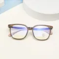 Detailed view of square retro TR90 anti-blue light glasses frame in brown translucent finish. - Cold Tea