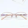 Women half rim oval eyeglasses frame rose gold optical metal spectacle frame detail view - Pink
