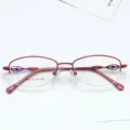 Women's semi-rimless oval eyeglass frames, red metal optical prescription spectacles for daily wear. - Burgundy
