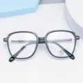 Detailed close-up view of stylish multi-sided anti-blue light TR90 optical glasses frame. - Bright Black