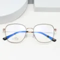 Detailed close-up of retro metal eyeglasses frame with square shape and clear optical lenses. - Black Rose