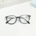 Close-up detail of retro black TR anti-blue light glasses frame with metal hinge accent. - Bright Black / Anti blue light