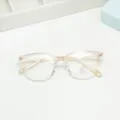 Ultralight TR retro clear frame anti blue light glasses detail shot, minimalist style. - Light Brown / Anti blue light
