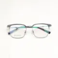 Detailed view of the stylish browline glasses frame with clear lower rim and metal upper part. - Transparent Gray