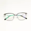 Classic half-rim browline eyeglasses frame for men and women, stylish metal and plastic design. - Olive Green