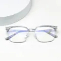 Detailed close-up of clear half-frame anti-blue light glasses showing precise temple markings and structure. - Transparent Gray
