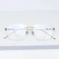 Monture de lunettes sans cadre en titane avec verres diamant et branches dorees. - Or Brillant