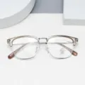 Designer anti-blue light glasses with a stylish half-rim frame for men and women daily wear. - Brown
