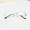 Classic semi-rimless oval metal eyeglass frame, lightweight business style, detailed view. - Black Silver