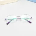 Purple half-frame titanium eyeglass frames, elegant oval design for women daily wear. - Purple