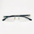 Occhiali da vista senza montatura da uomo business con ponte in metallo dorato ed eleganti aste nere. - Oro Lucido