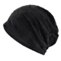 Gros plan sur la texture du bonnet slouchy noir léger et respirant à motif zébré. - Fleur Papillon(385) / Noir