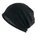 Détail de bonnet en tricot ajouré noir montrant un motif losange respirant et souple. - Taille unique / Noir