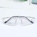 Lightweight rimless titanium prescription eyeglasses frame for men and women minimalist style. - Silver White