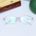 Vista dettagliata della montatura per occhiali da vista semi-rimless in metallo rosa con dettagli. - Rosa