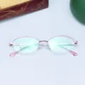 Detail view of women's memory titanium eyeglasses frame, elegant rose gold optical glasses. - Pink