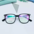 Close-up detail of black TR90 optical glasses frame, vintage square design, lightweight daily wear. - Matte Black