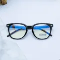 Montatura per occhiali nera TR90 con lenti anti-luce blu e stanghette effetto legno. - Nero lucido