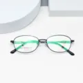 Detailed close-up view of the lightweight black business optical eyeglass frame with clear specs. - Black