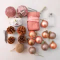 Pink mini Christmas tree DIY accessory kit featuring decorative balls and natural pine cones. - Pink House, 60 cm