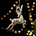 Ornement suspendu de renne de Noël doré pour décoration d'arbre de fête et ambiance. - Renne doré avec tête tournée