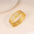 Stainless steel gold wide hollow flower crystal bangle detail, exquisite fashion jewelry. - Gold