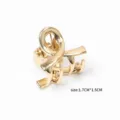 Détail de pince à cheveux griffe en métal doré minimaliste, petite taille 1.7cm accessoire. - Croisé