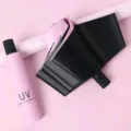 Pink capsule mini sunscreen umbrella with black vinyl UV protection coating compact size. - Manual Open UV Pink