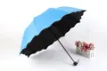 Compact folding sun umbrella with black UV protection lining and stylish wavy edge design. - Radius: 55cm * 8K Umbrellas / Blue