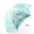 Parapluie pliante bleu clair avec broderie exquise, bordure en dentelle et appliqués. - Vert