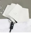 Scatto di dettaglio di un ombrello pieghevole automatico anti-UV con manico nero e tessuto. - Colla Nera Automatica UV / Bianco Albicocca