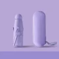 Compacte opvouwbare capsule paraplu draagbare mini zon en regen paraplu met opbergdoos lila - Ronde paraplu met 8 baleinen, paars (volledige verduistering)