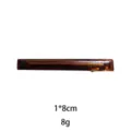 Detailed view of the brown resin hair clip, showcasing the smooth tortoiseshell pattern and compact design. - 8cm / Brown