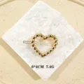 Fermaglio per capelli a cuore dorato intrecciato, elegante accessorio geometrico. - Cuore intrecciato / Oro