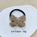 Gouden vlinder haar elastiek met gehamerde textuur stijlvolle paardenstaart haaraccessoire - 1105-12