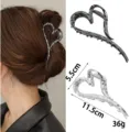 Detail view of the abstract liquid metal heart hair claw clip, showing dimensions and wear. - Irregular Heart Style (Set 1) / 2 Pcs/Set