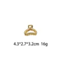 Pinza de pelo dorada metal irregular hueco garra para cabello tamaño mediano 4.3cm - Estilo Dorado Líquido Envolvente (1157-7)