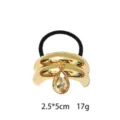 Glossy gold alloy hair tie with teardrop crystal pendant and black elastic hair band. - Crystal Style (1116-10)