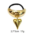 Gold metal heart hair tie with black elastic band, elegant shiny hair accessory for women styling. - Heart Style (1116-58)