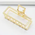 Golden minimalist rectangular metal hair claw clip detail shot for elegant daily hairstyles. - Rectangular 6