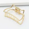 Gold metal hair claw clip detail, minimalist cat ear design, strong grip for thick hair daily wear. - Cat Ears 8
